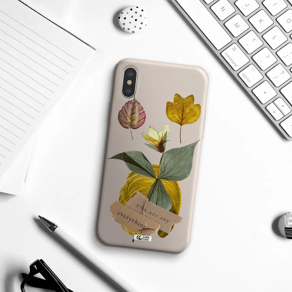 a flower with leaves and a box Apple iPhone XS Silicone Stone Case