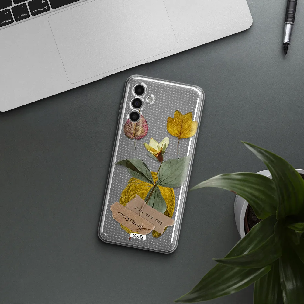 A Flower With Leaves And A Box Samsung A13 5G Clear Tpu Case