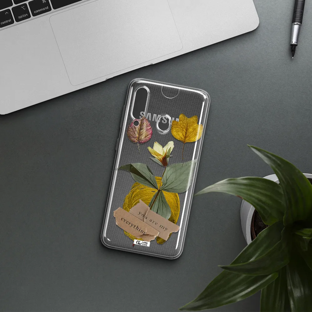 A Flower With Leaves And A Box Samsung A60 Clear Tpu Case