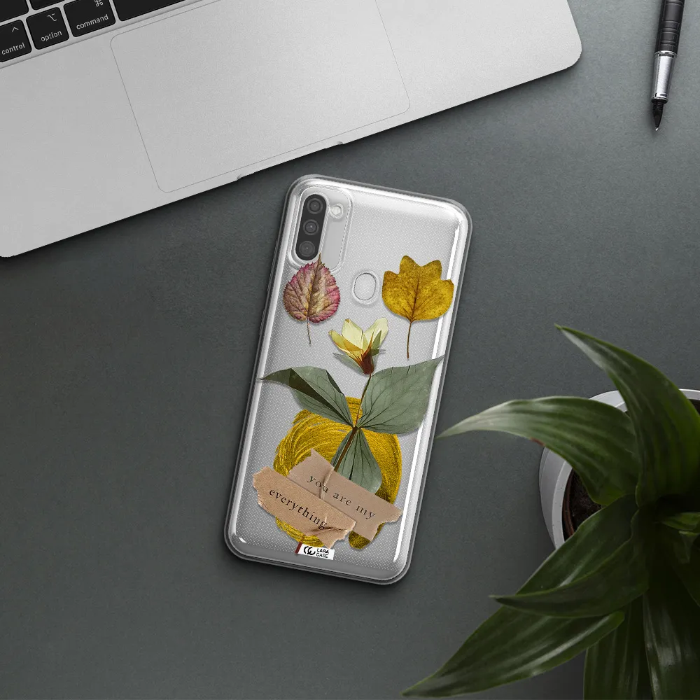 A Flower With Leaves And A Box Samsung M11 Clear Tpu Case