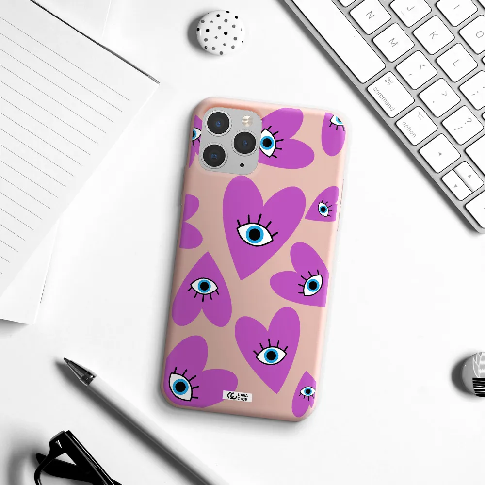 a purple heart with eyes and a black eye Apple iPhone 11 pro max Silicone pastel pink Case