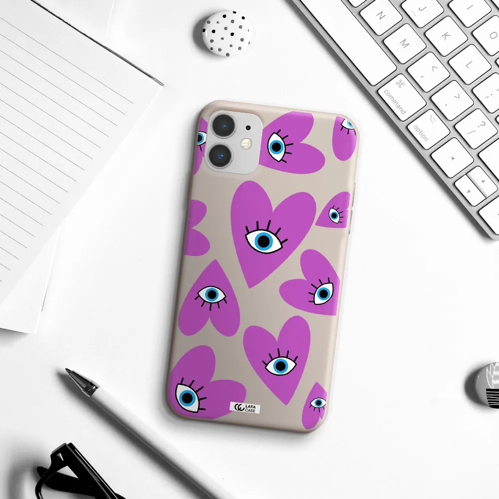 a purple heart with eyes and a black eye Apple iPhone 11 Silicone Stone Case
