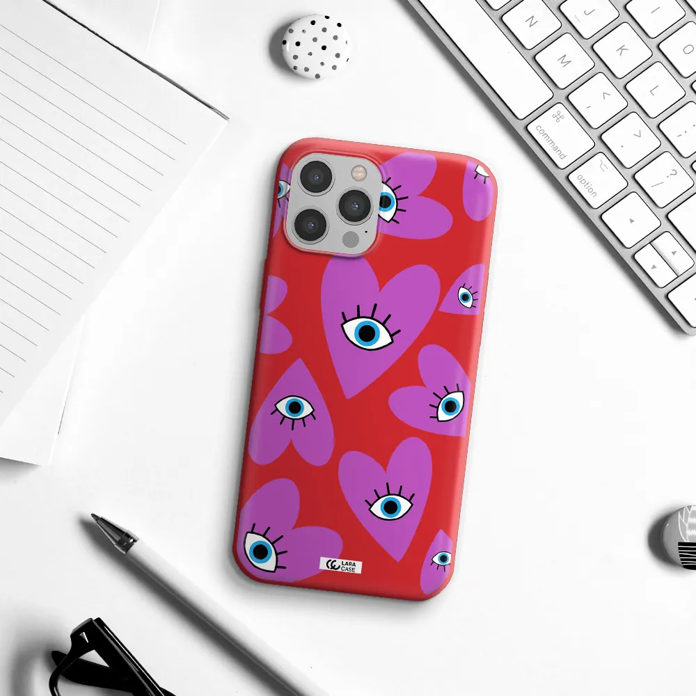 a purple heart with eyes and a black eye Apple iPhone 12 pro Silicone Imperial Red Case