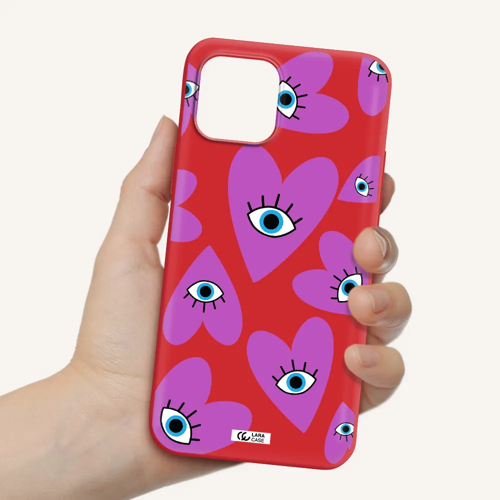a purple heart with eyes and a black eye Apple iPhone 12 Silicone Imperial Red Case