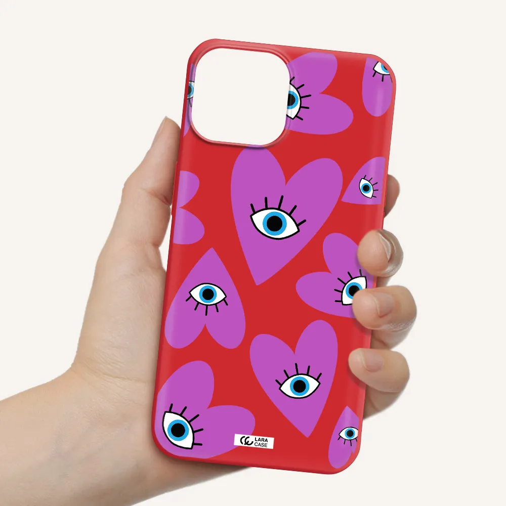a purple heart with eyes and a black eye Apple iPhone 13 mini Silicone Imperial Red Case