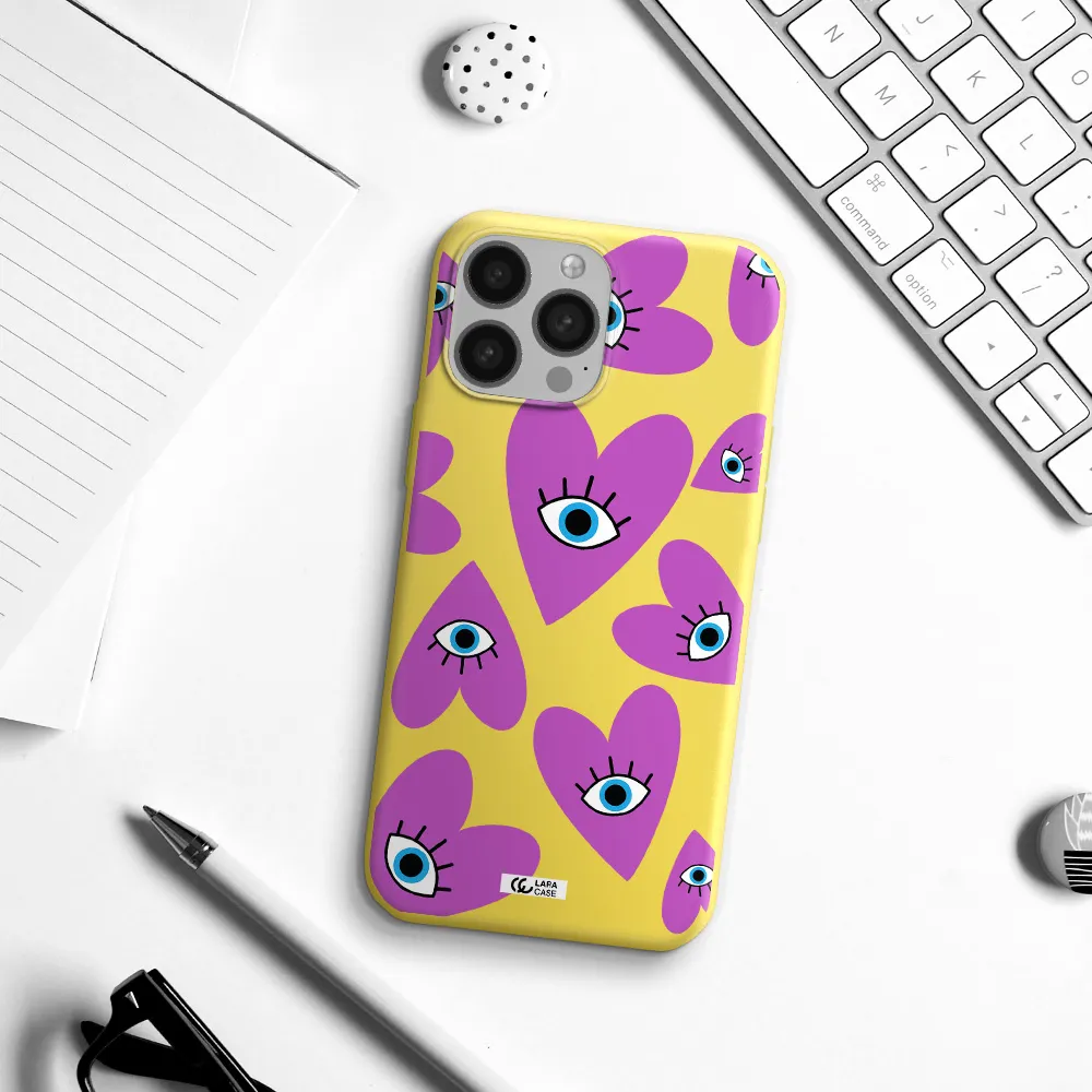 a purple heart with eyes and a black eye Apple iPhone 13 Pro Max Silicone canary yellow Case