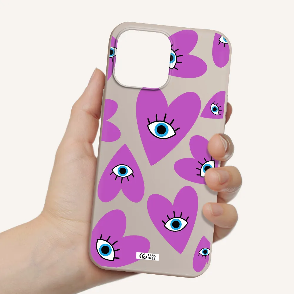 a purple heart with eyes and a black eye Apple iPhone 13 Pro Silicone Stone Case