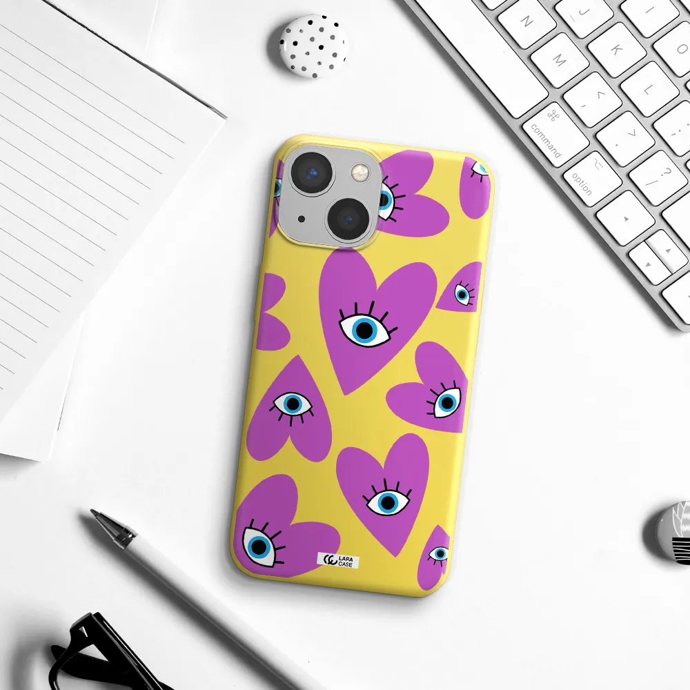 a purple heart with eyes and a black eye Apple iPhone 13 Silicone canary yellow Case