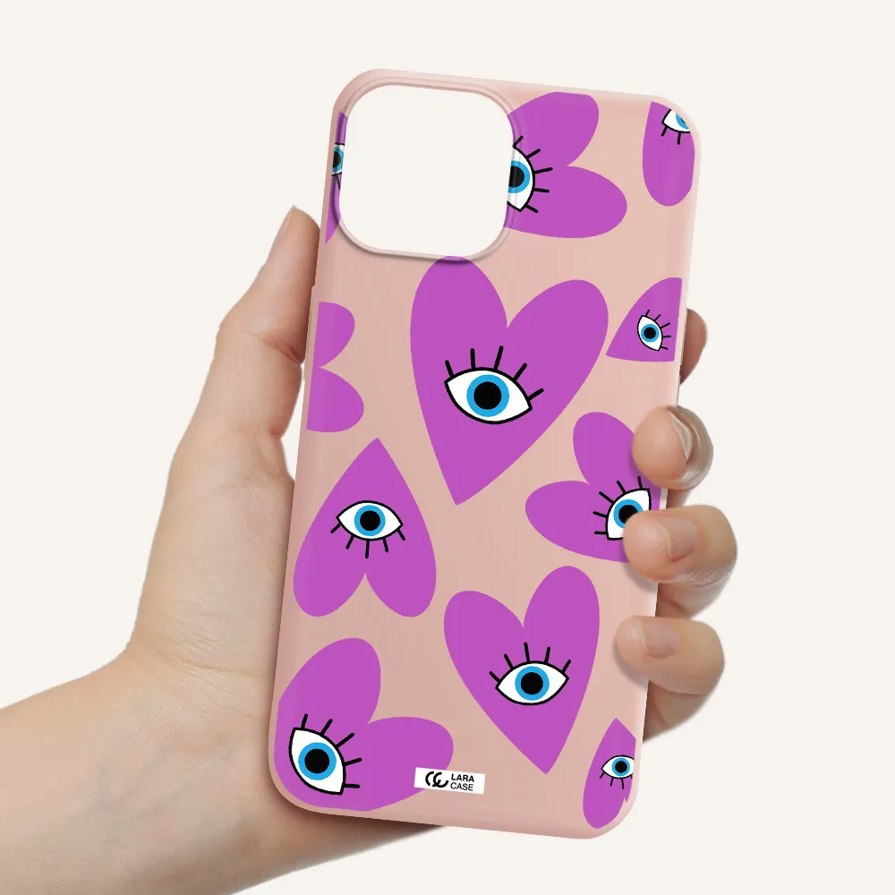 a purple heart with eyes and a black eye Apple iPhone 13 Silicone pastel pink Case