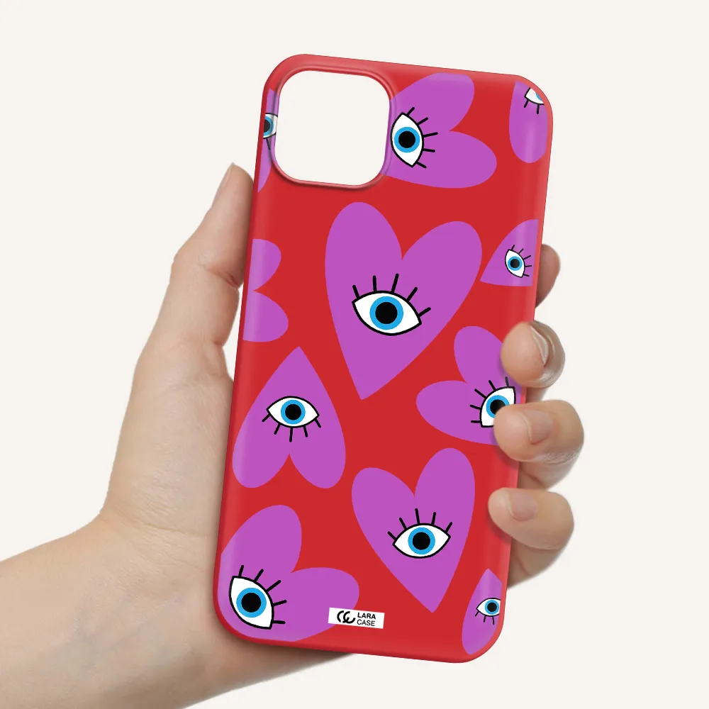 a purple heart with eyes and a black eye Apple iPhone 14 plus Silicone Imperial Red Case