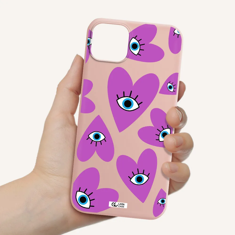 a purple heart with eyes and a black eye Apple iPhone 14 Silicone pastel pink Case
