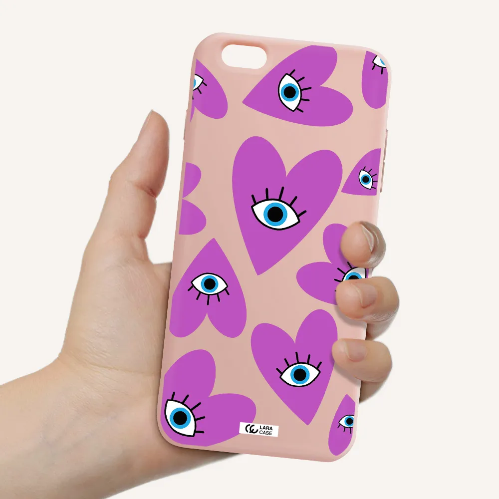 a purple heart with eyes and a black eye Apple iPhone 6S Silicone pastel pink Case