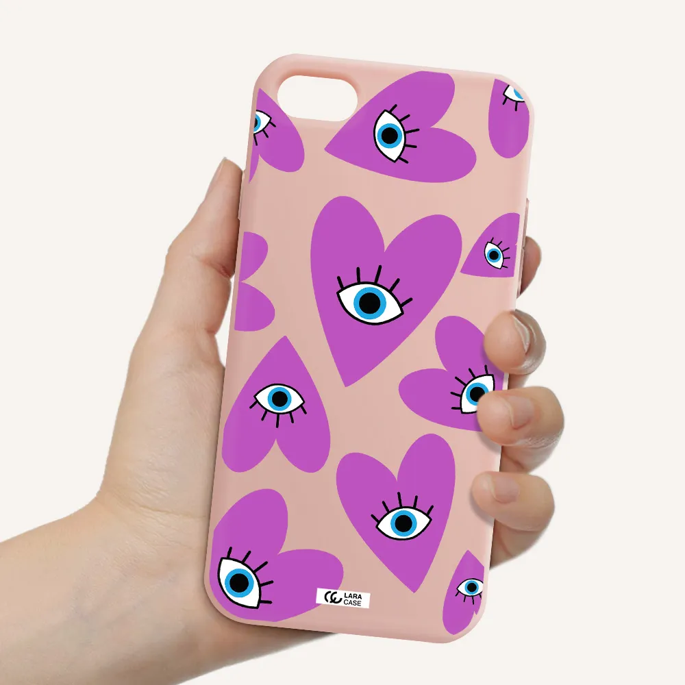 a purple heart with eyes and a black eye Apple iPhone 7 Silicone pastel pink Case