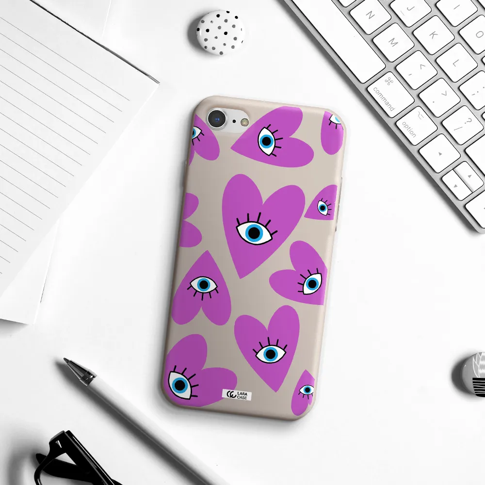 a purple heart with eyes and a black eye Apple iPhone 7 Silicone Stone Case
