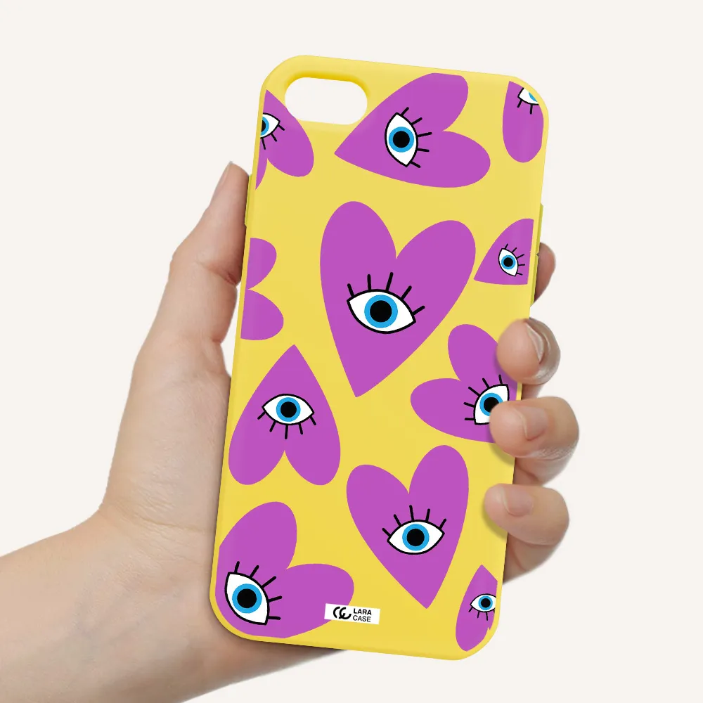 a purple heart with eyes and a black eye Apple iPhone 8 Silicone canary yellow Case