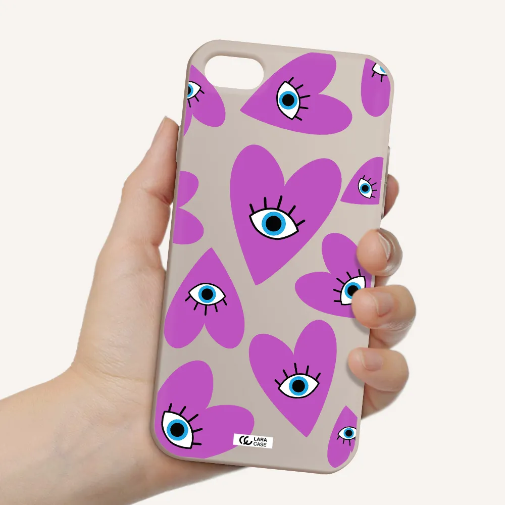 a purple heart with eyes and a black eye Apple iPhone 8 Silicone Stone Case