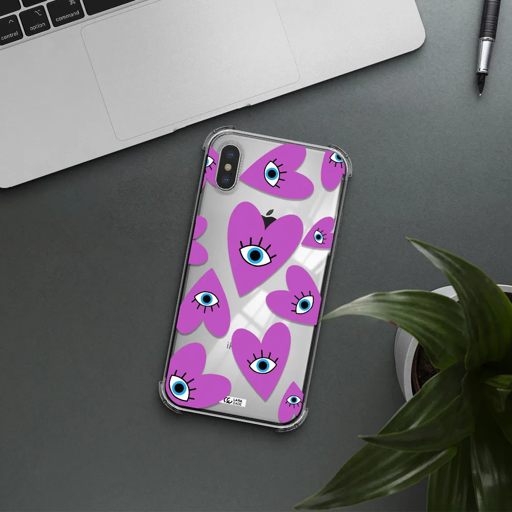 a purple heart with eyes and a black eye Apple iPhone X Clear PC Case