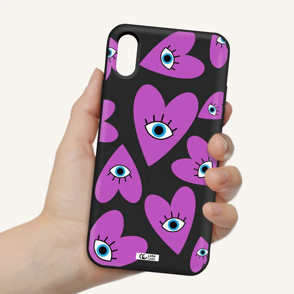 a purple heart with eyes and a black eye Apple iPhone X Silicone black Case