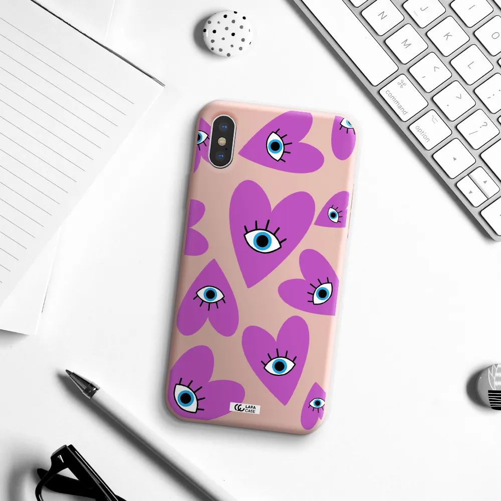 a purple heart with eyes and a black eye Apple iPhone XS Silicone pastel pink Case