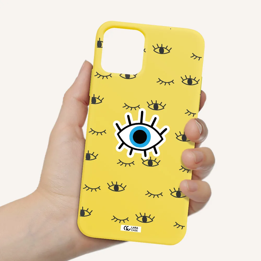 a blue eye with black eyeballs and eyelashes Apple iPhone 11 pro max Silicone canary yellow Case