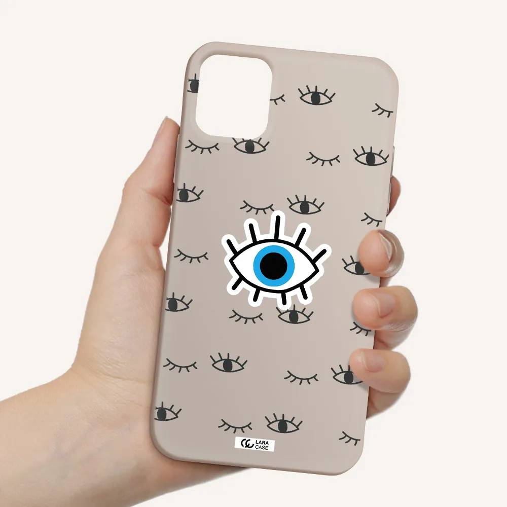 a blue eye with black eyeballs and eyelashes Apple iPhone 11 Silicone Stone Case