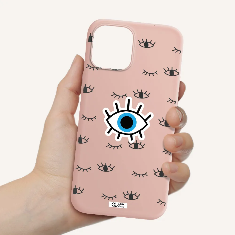 a blue eye with black eyeballs and eyelashes Apple iPhone 12 pro Silicone pastel pink Case