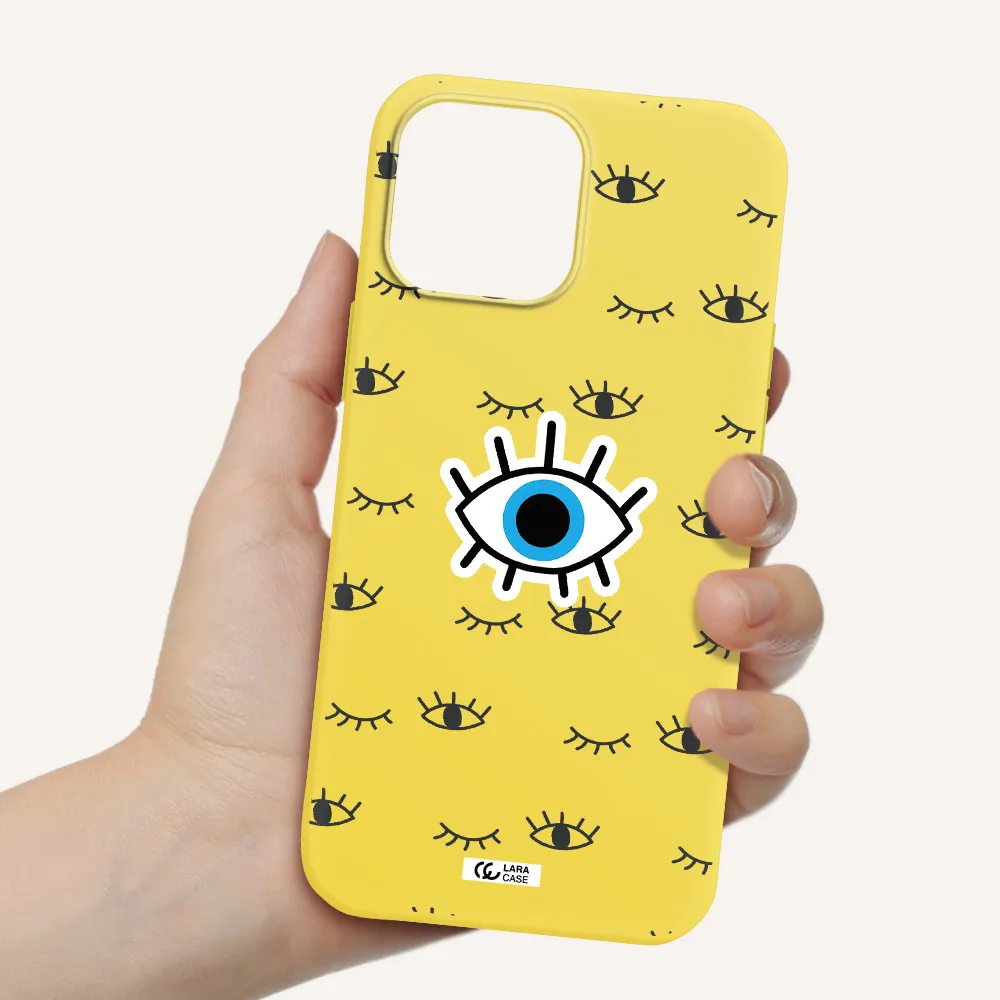 a blue eye with black eyeballs and eyelashes Apple iPhone 13 Pro Max Silicone canary yellow Case