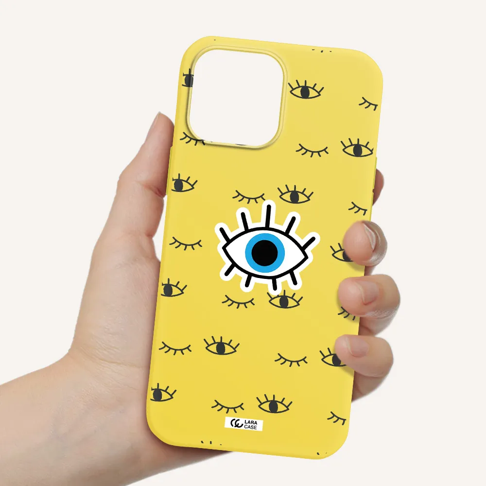 a blue eye with black eyeballs and eyelashes Apple iPhone 13 Pro Silicone canary yellow Case