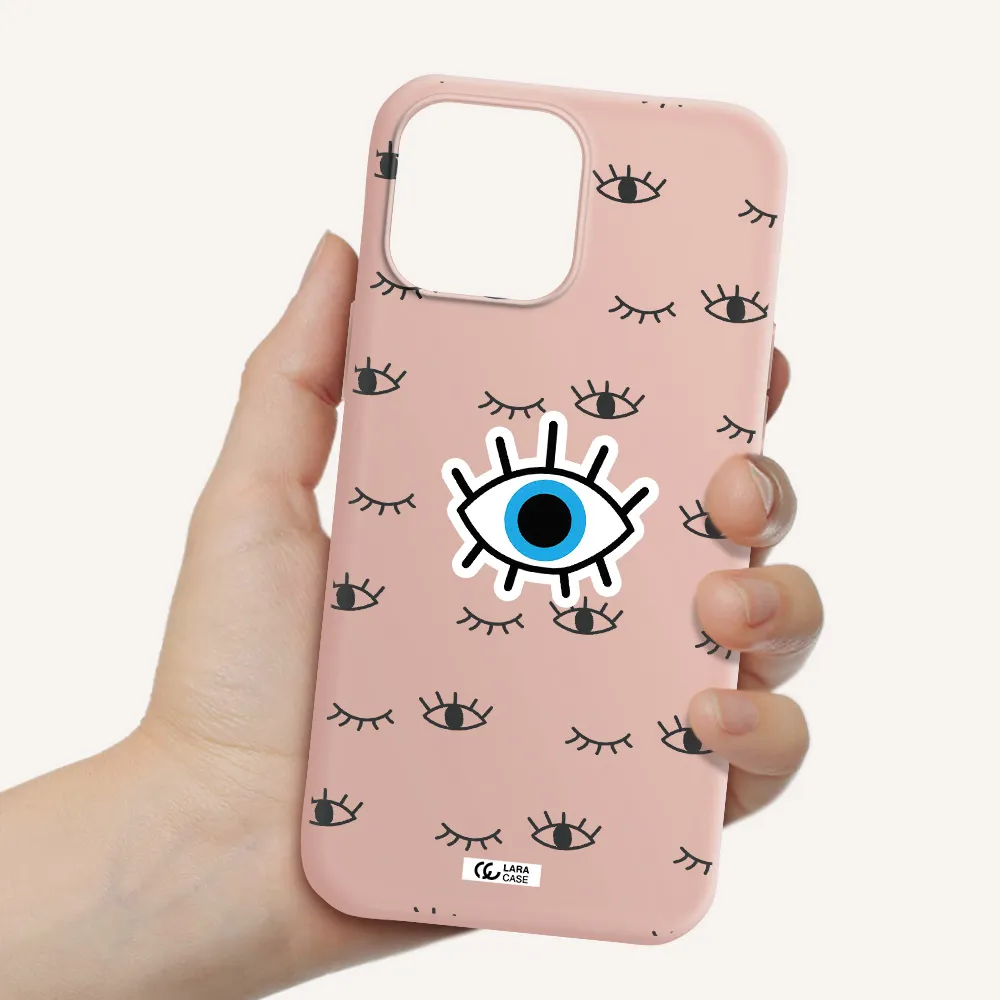 a blue eye with black eyeballs and eyelashes Apple iPhone 13 Pro Silicone pastel pink Case