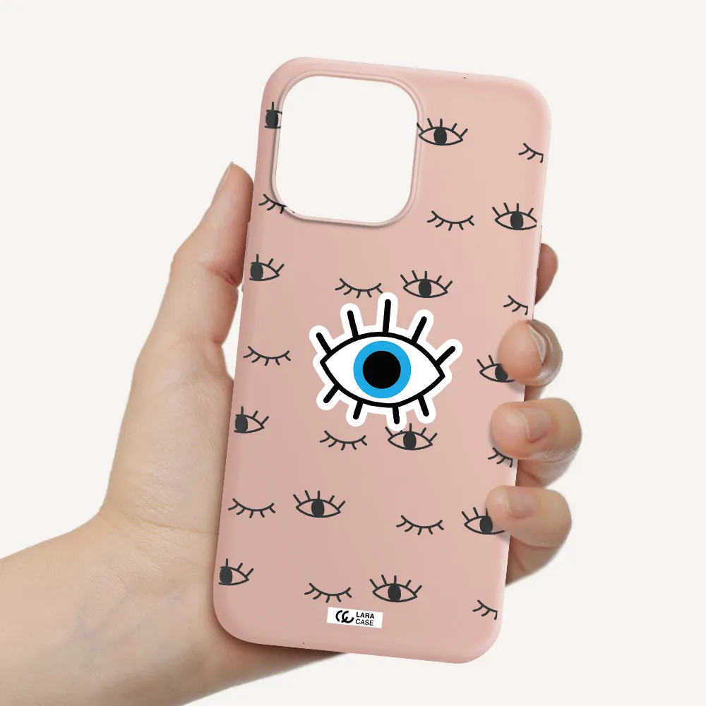 a blue eye with black eyeballs and eyelashes Apple iPhone 14 pro Silicone pastel pink Case