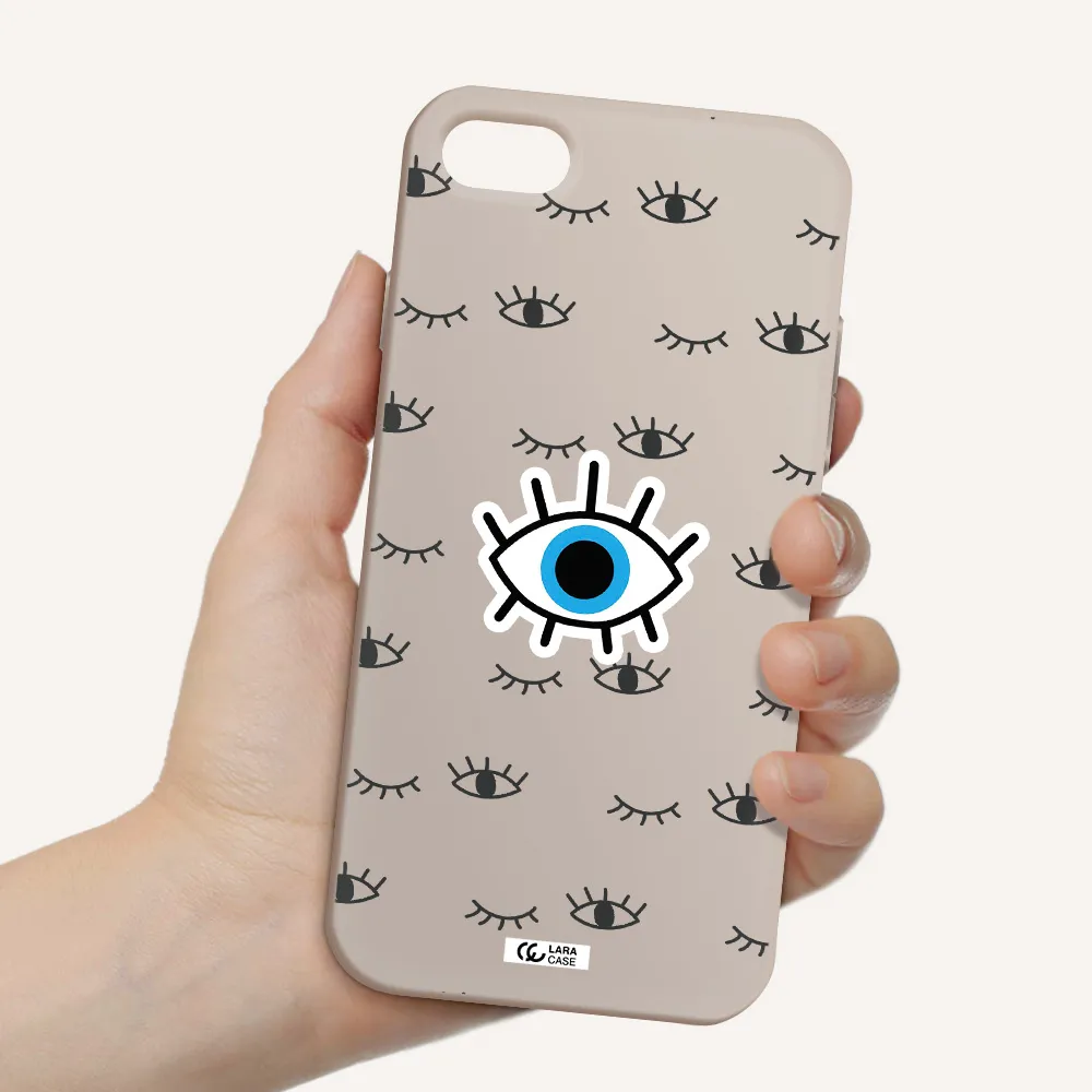 a blue eye with black eyeballs and eyelashes Apple iPhone 7 Silicone Stone Case