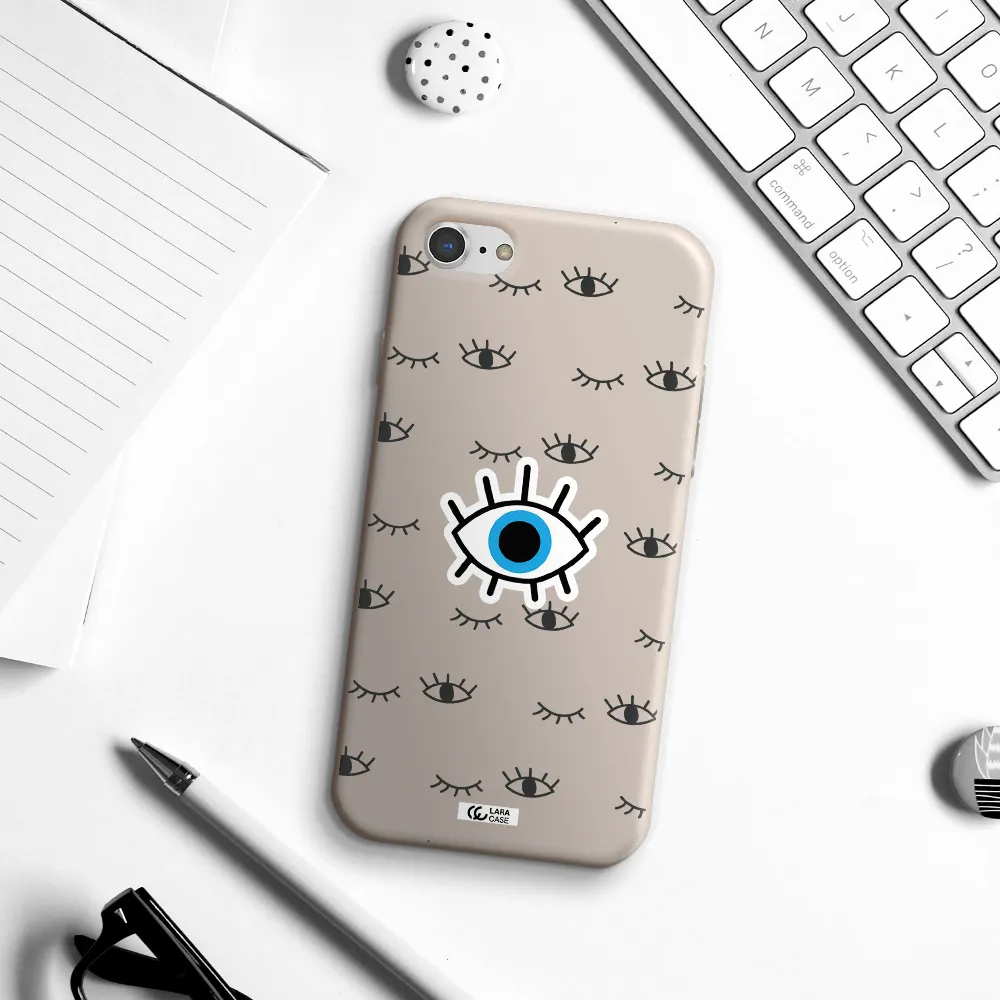 a blue eye with black eyeballs and eyelashes Apple iPhone 7 Silicone Stone Case