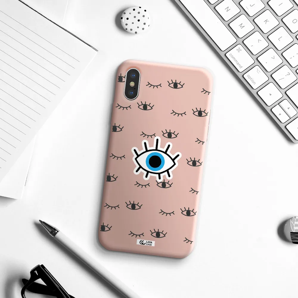 a blue eye with black eyeballs and eyelashes Apple iPhone X Silicone pastel pink Case
