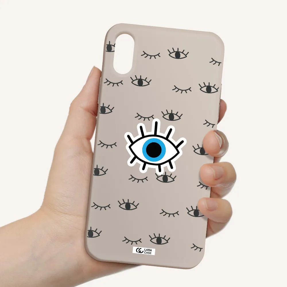a blue eye with black eyeballs and eyelashes Apple iPhone X Silicone Stone Case