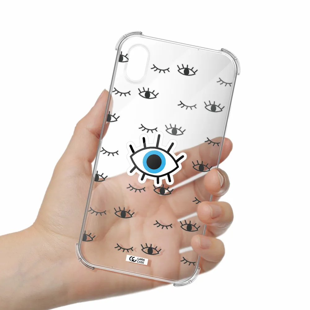 a blue eye with black eyeballs and eyelashes Apple iPhone XR Clear PC Case